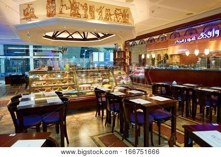 DUBAI, UAE - CIRCA NOVEMBER, 2016: inside Dubai Airport. There are a lot of restaurants, bars, cafes and shops in Dubai International Airport. Almost all of them are open twenty-four hours.