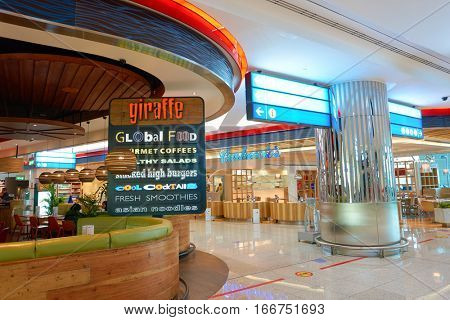 DUBAI, UAE - CIRCA NOVEMBER, 2016: inside Dubai Airport. There are a lot of restaurants, bars, cafes and shops in Dubai International Airport. Almost all of them are open twenty-four hours.
