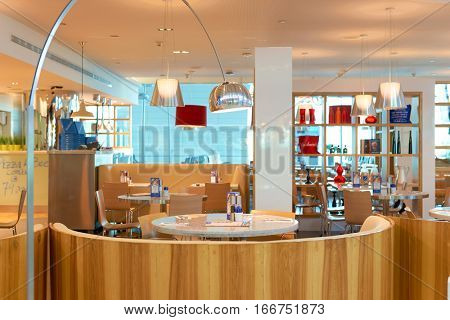 DUBAI, UAE - CIRCA NOVEMBER, 2016: inside Dubai Airport. There are a lot of restaurants, bars, cafes and shops in Dubai International Airport. Almost all of them are open twenty-four hours.