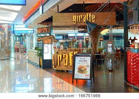 DUBAI, UAE - CIRCA NOVEMBER, 2016: inside Dubai Airport. There are a lot of restaurants, bars, cafes and shops in Dubai International Airport. Almost all of them are open twenty-four hours.