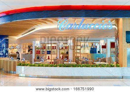 DUBAI, UAE - CIRCA NOVEMBER, 2016: inside Dubai Airport. There are a lot of restaurants, bars, cafes and shops in Dubai International Airport. Almost all of them are open twenty-four hours.