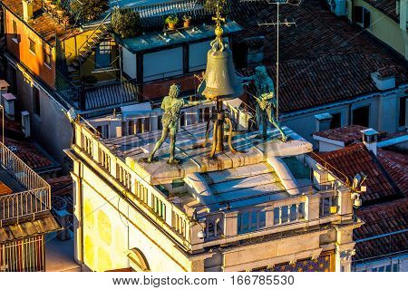 Zodiac clock in Venice, Italy. Clock Tower with  two moors striking the bell - early Renaissance (1497) building in Venice, located the north side of Piazza San Marco, Italy. Aerial view.