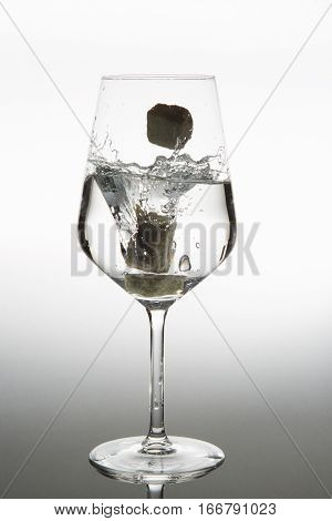 water poured into glass ON WHITE BACKGROUND