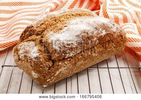 fresh home baked bread on a cooling rack