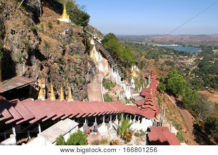 Path to the Pindaya caves Buddhist shrine where thousands of Buddha images have been consecrated for worship over the centuries