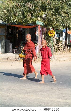 Thazi Myanmar - 11 January 2010: Buddhist monks walking on the street of Thazi on Myanmar