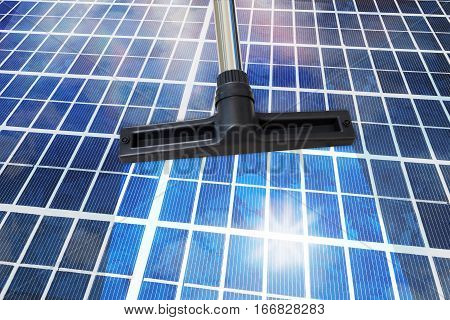 Close-Up Of A Cleansing Tool On Shiny Solar Panel Roof. Sustainable Energy Concept