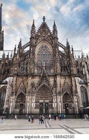 Cologne Cathedral on the west side and Square Roncalli in Cologne, Germany. The Dom - Roman Catholic Gothic cathedral