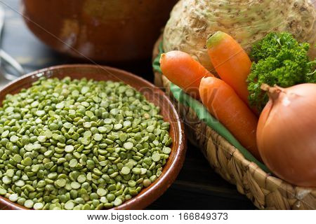 Ingredients for dried split pea vegetarian soup - carrot celery root onion parsley