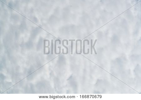 Rainy Sky with White Fluffy Clouds Background