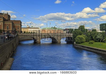 STOCKHOLM, SWEDEN - JUNE 27, 2016: This is the bridge Norrbro from downtown to the Royal Palace by the Swedish Parliament.