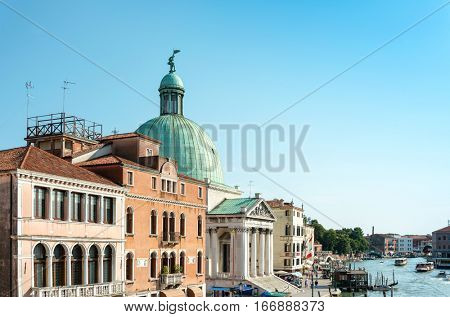 VENICE, ITALY - June 30, 2016. view of water street and old buildings in Venice on May 26, 2015. its entirety is listed as a World Heritage Site, along with its lagoon.une 30, 2016 VENICE, ITALY