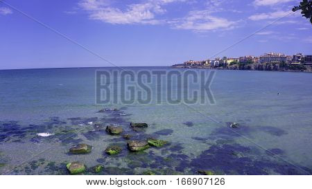 sea beach ocean travel water rock nature boat ship transport port fish trawler sky flora fauna  boats
