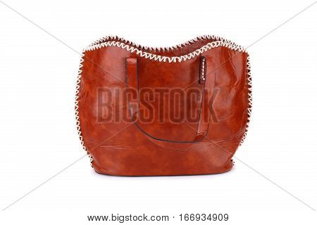 Brown leather handbag isolated on white background.