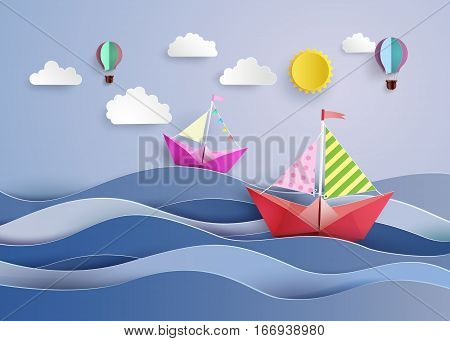 origami made colorful paper sailing boat and balloon