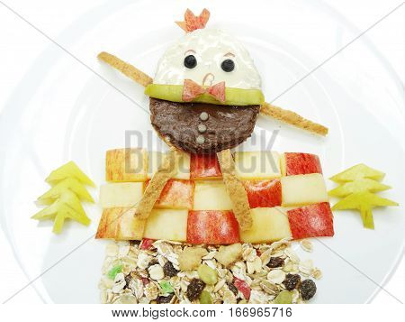 creative breakfast food with fruit and chocolate sweet cream on bread