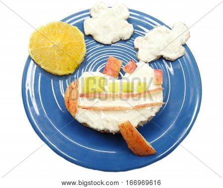 creative breakfast food with fruit and chocolate sweet cream on bread