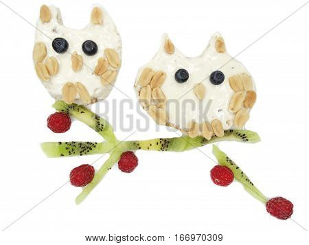 creative breakfast food with fruit and chocolate sweet cream on bread