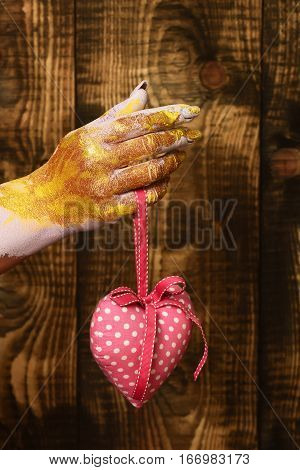 Female Hand Holding Valentine Heart