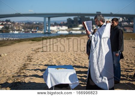PORTO, PORTUGAL - JAN 19, 2017: Celebrating Baptism of Jesus in the Parish of Russian Orthodox Church near Douro river. This is one of the holiest holidays for all Christians. 