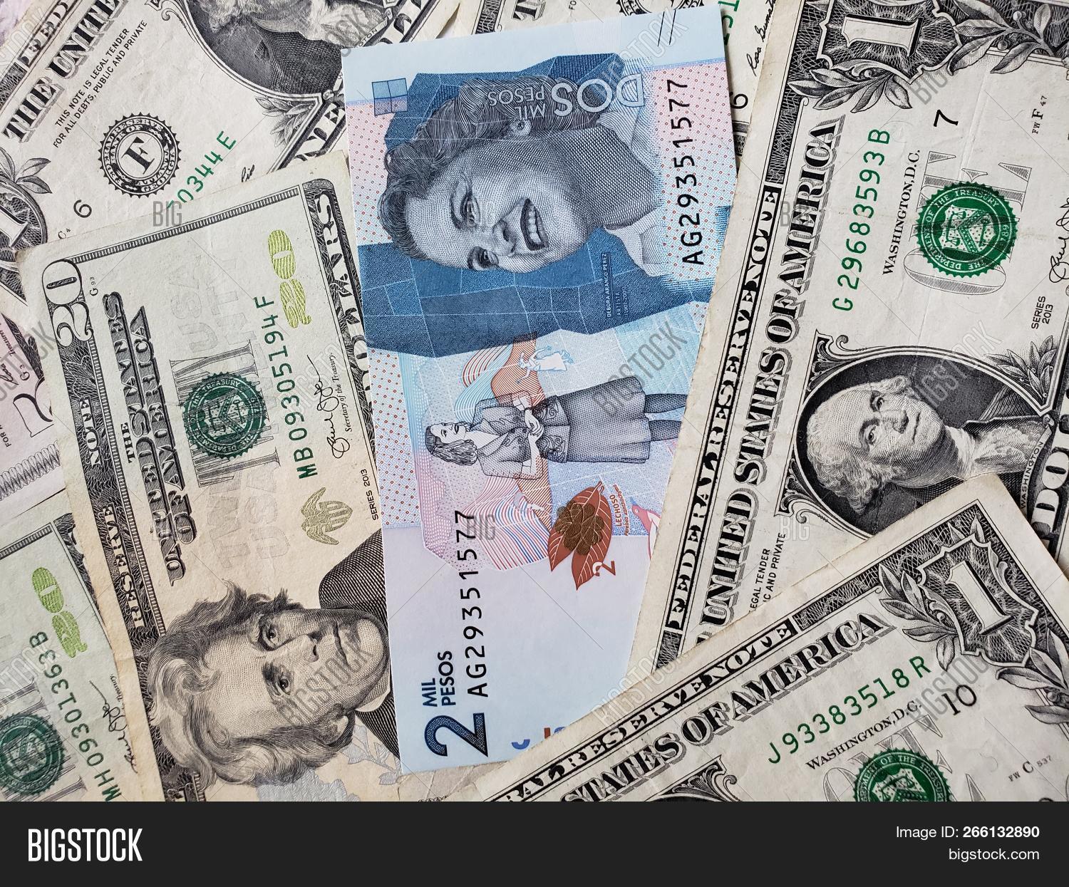 Colombian Banknote Image Photo Free Trial Stock Colombian Banknote Of 2000 Pesos And American Dollars Bills Background Texture