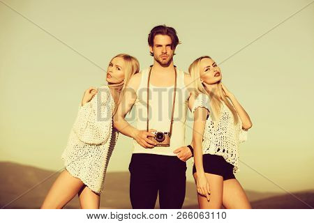 Man With Muscular Body With Twins. Love And Romance. Beauty And Art Fashion. Guy With Photo Camera O