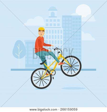 Young Guy Rides A Bike And Performs Complex Stunts.
