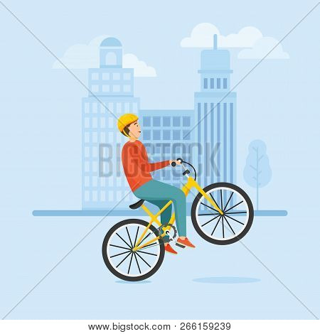 Young Guy Rides A Bike And Performs Complex Stunts.