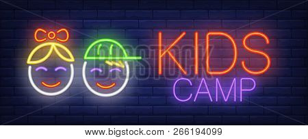 Kids Camp Neon Sign. Glowing Neon Inscription With Baby Faces Of Girl And Boy On Blue Brick Backgrou