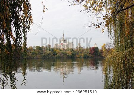 Beautiful Autumn Day In Herastrau Park, With House Of Free Press (casa Presei Libere) In The Backgro