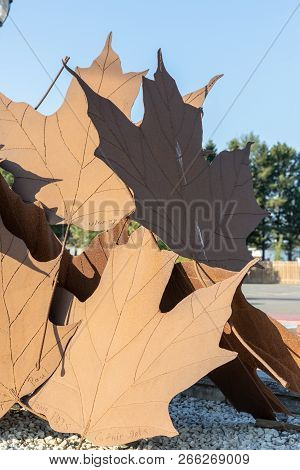 St Quentin, New Brunswick - September 14,2018 - Vertical Close Up Of A Large Maple Leaf Sculpture In