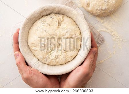 Hands Holding Dough Ready For Baking, Closeup, Copy Space.