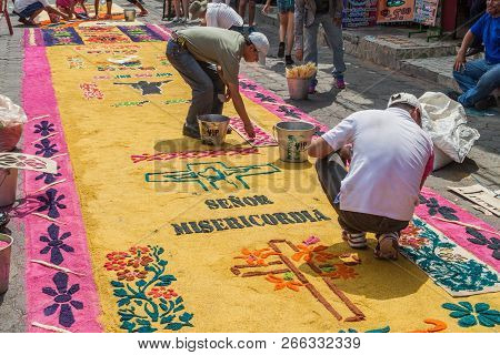 Panajachel, Guatemala - March 25, 2016: People Decorate Easter Carpets In Panajachel Village, Guatem