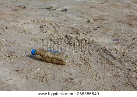 The Sandy Beach Is A Natural Area That Should Be Preserved. But Some Tourists Bring A Natural End. T