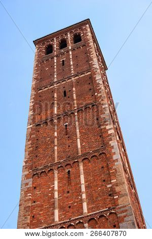 Milan, Lombardy, Italy. Bell Tower Of The Church Of Santambrogio. In The Church Of Sant Ambrogio The