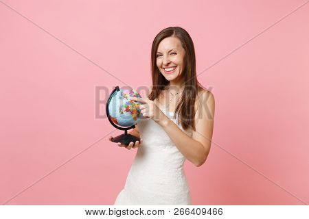 Portrait Of Smiling Bride Woman In Lace White Wedding Dress Holding World Globe, Choosing Place, Cou