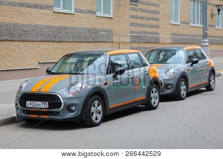 MOSCOW - APR 29, 2018: Two grey BMW mini cars of Moscow carsharing company You drive at street, carsharing is system of short-term car rental with per minute payment