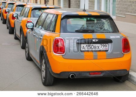 MOSCOW - APR 29, 2018: Five grey BMW mini cars of Moscow carsharing company You drive are outdoor, carsharing is system of short-term car rental with per minute payment