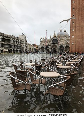 Venice, Italy - 1 November 2018: San Marco square under water, city has been flooded by waters rising 156 cm
