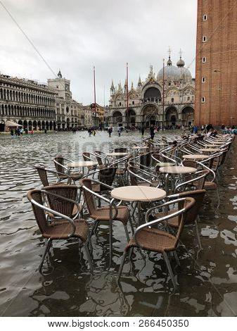 Venice, Italy - 1 November 2018: San Marco square under water, city has been flooded by waters rising 156 cm
