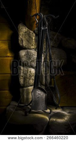 Tools By A Fireplace Ready To Be Used