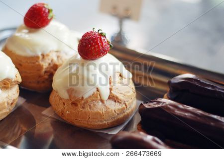 Sweet Desserts And Cakes In A Vitrine Of A Cafe
