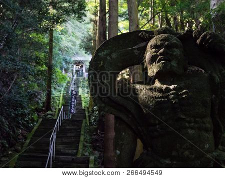 Kunisaki, Japan - October 30, 2016: Stone Buddhist Guardian Statue At The Entrance To Monjusenji Tem