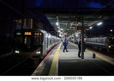 Hineno, Japan - November 1, 2018: Japan Railways Train Bound For Tennoji Station Waits At Platform I