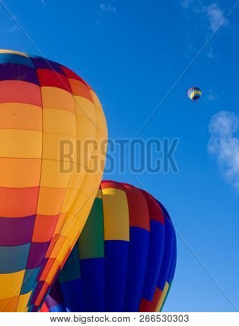 Colorful Hot Air Ballons Against Blue Sky At Winthrop Balloon Festival