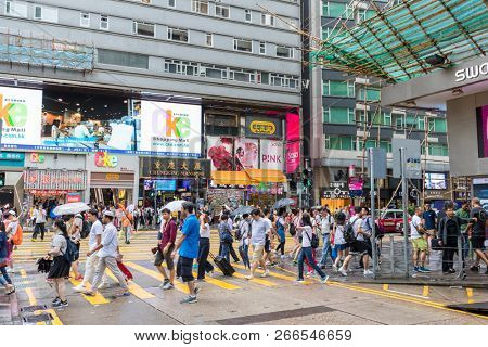 Tsim Sha Tsui, Hong Kong 17 August 2018:- People cross the street