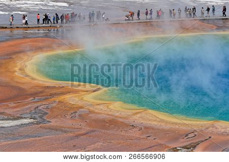 Yellowstone Park, Wyoming, September 22, 2018 : Tourists Visit The Grand Prismatic Spring In Yellows