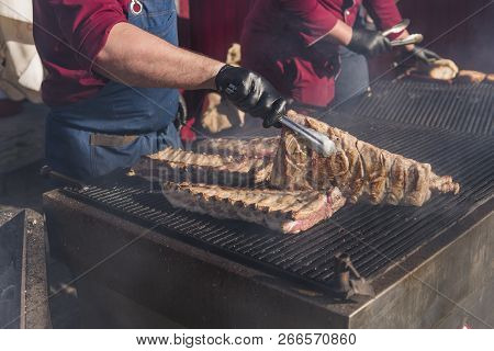Cooking Pork Ribs On A Grill. Meat On A Grills.