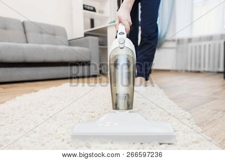 Cleaning Service With Professional Equipment During Work. Professiona Carpet Dry Cleaning, Sofa Dry 