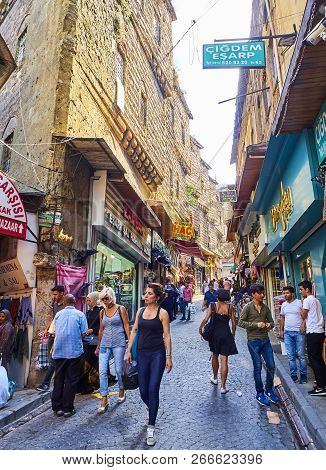 Istanbul, Turkey - July 11, 2018. Citizens Walking In Cakmakcilar Street, A Typical Comercial Street